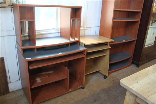 2 computer desks and a bookcase